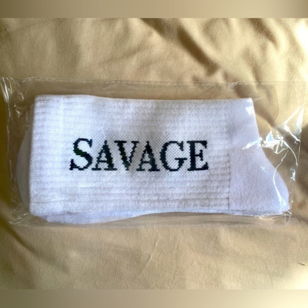 *NEVER WORN Fashion Tube Socks with graphic “Savage” in White and Black